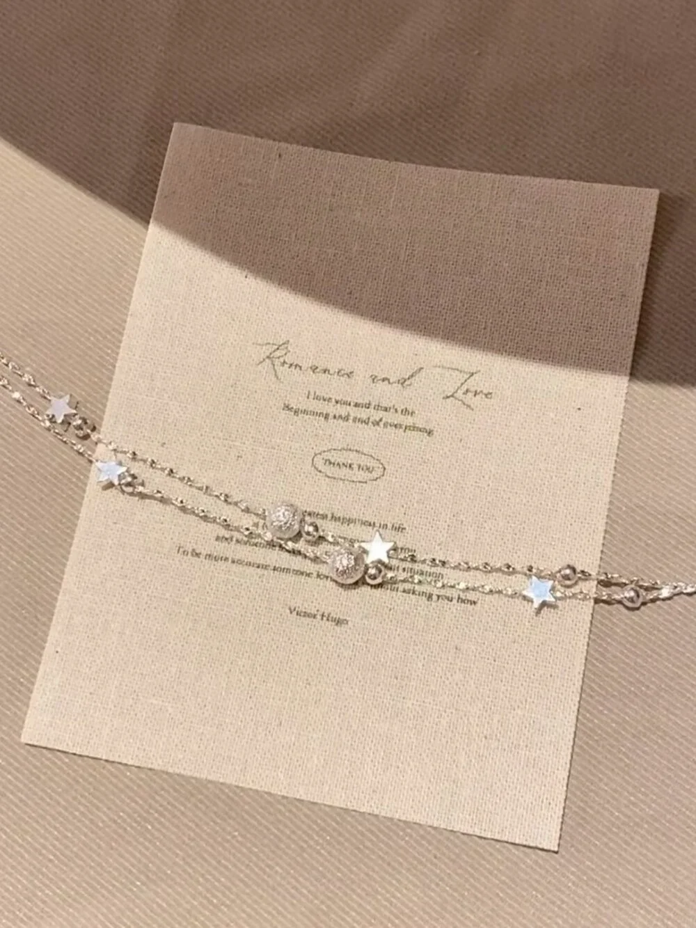 Dainty double strand star bracelet